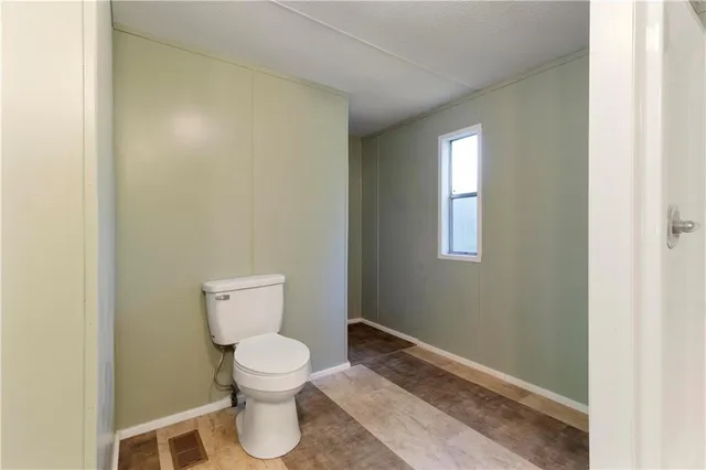 a view of a room with rack on the wall