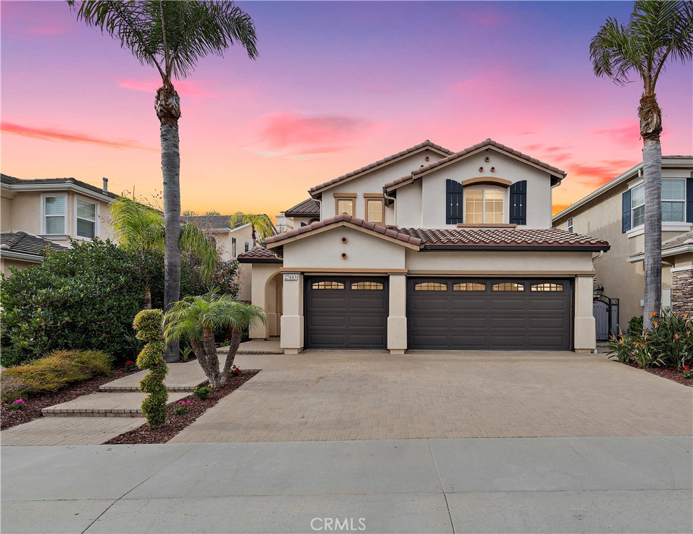 27485 Homestead Road Laguna Niguel, CA 92677 - Photo 1 of 1 a front view of a house with a yard and garage