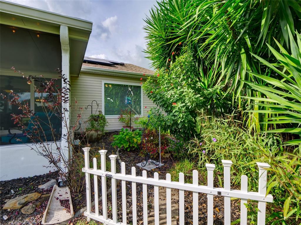4704 River Ridge Drive Leesburg, FL 34748 - Photo 32 of 40 a view of a house with a small yard