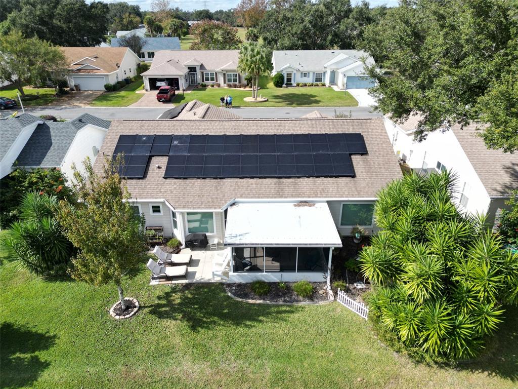 4704 River Ridge Drive Leesburg, FL 34748 - Photo 33 of 40 an aerial view of a house with a yard