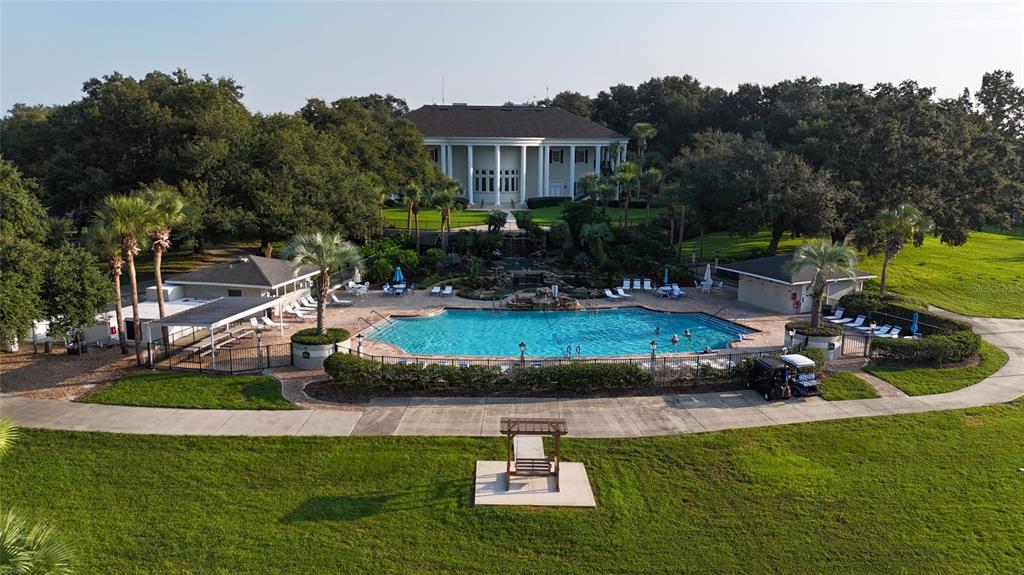 4704 River Ridge Drive Leesburg, FL 34748 - Photo 35 of 40 a view of a house with a yard patio and swimming pool