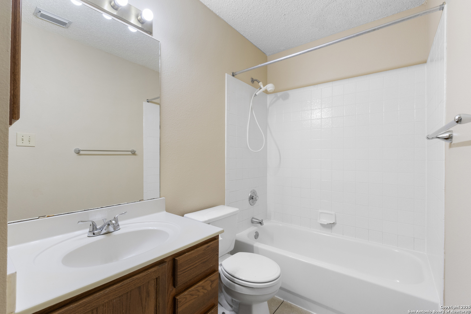 1555 Jasmine Schertz, TX 78154 - Photo 18 of 23 a bathroom with a sink a toilet and shower