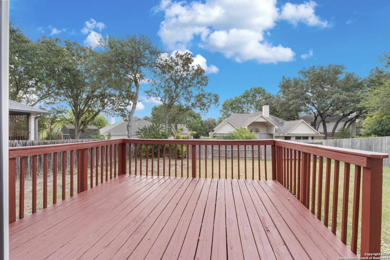 1555 Jasmine Schertz, TX 78154 - Photo 23 of 23 a view of a balcony with wooden fence