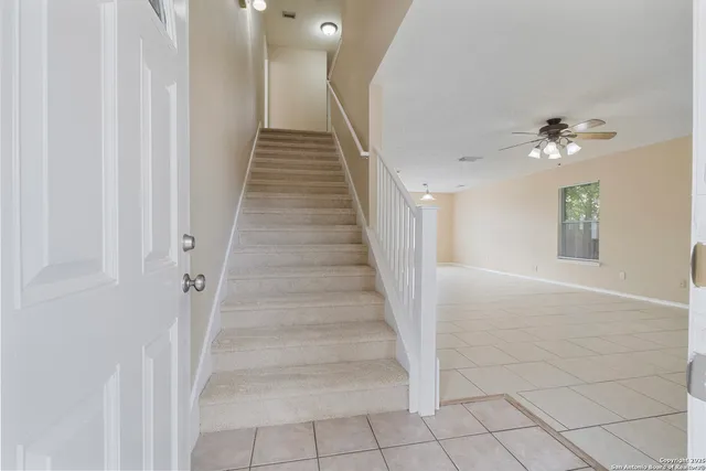 a view of staircase with white walls and white walls