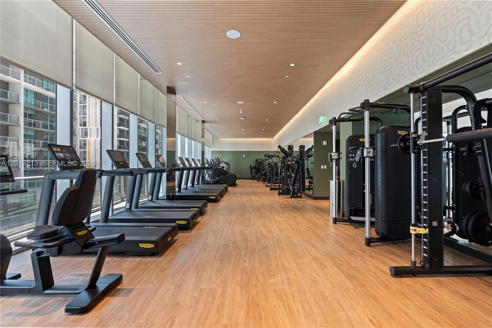 77 Southeast 5th, Unit 3702 Miami, FL 33131 - Photo 43 of 63 a view of a room with gym equipment