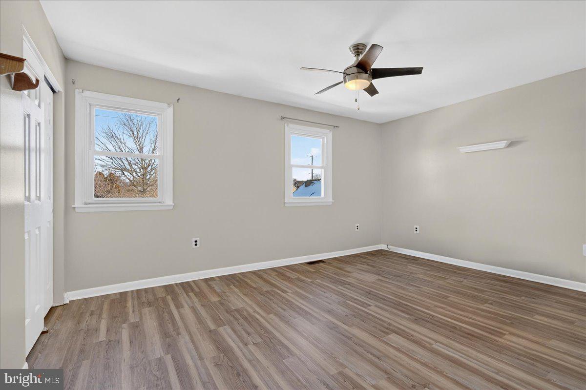 1158 Grove Street Pottstown, PA 19464 - Photo 14 of 26 wooden floor in an empty room with a window