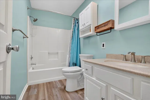 a work room with furniture and a lamp