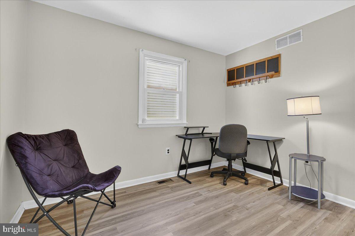 1158 Grove Street Pottstown, PA 19464 - Photo 20 of 26 a work room with furniture and a lamp