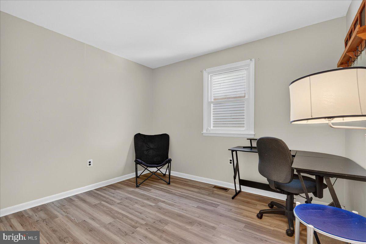 1158 Grove Street Pottstown, PA 19464 - Photo 21 of 26 a view of a workspace with furniture and a window
