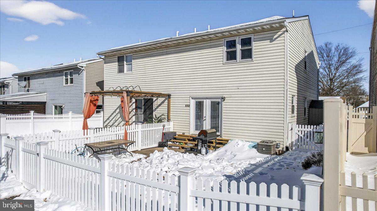 1158 Grove Street Pottstown, PA 19464 - Photo 26 of 26 a view of a house with wooden floor and a small yard