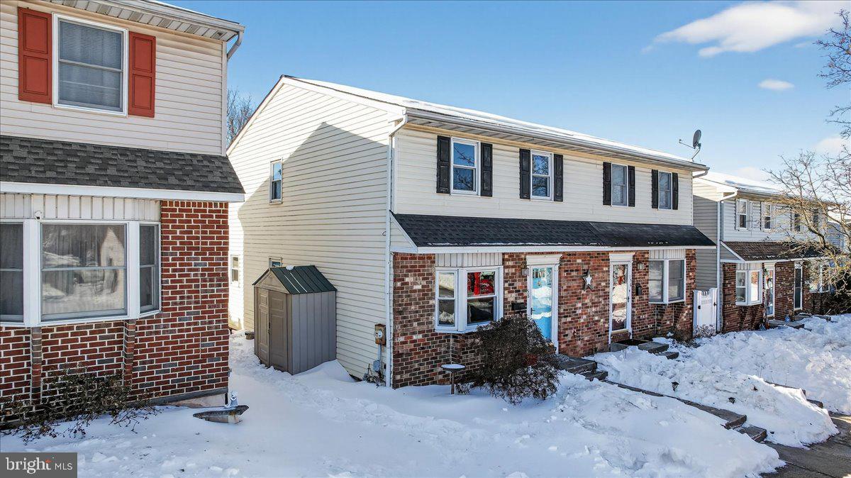 1158 Grove Street Pottstown, PA 19464 - Photo 3 of 26 a front view of a house with parking