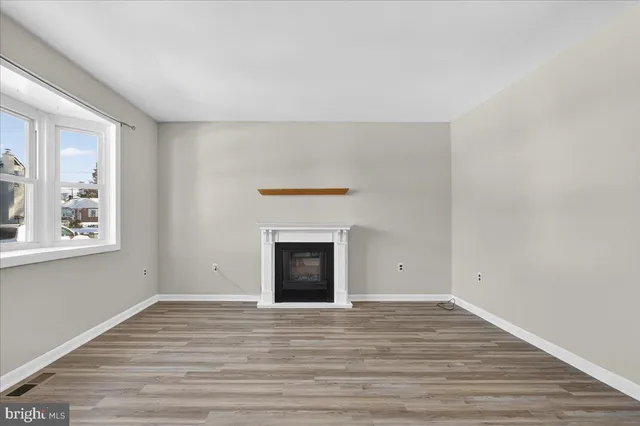 a kitchen with a sink stove and refrigerator