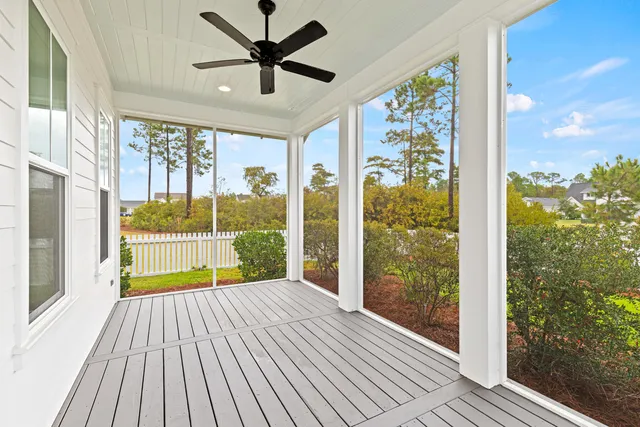 a view of a room with wooden floor and balcony