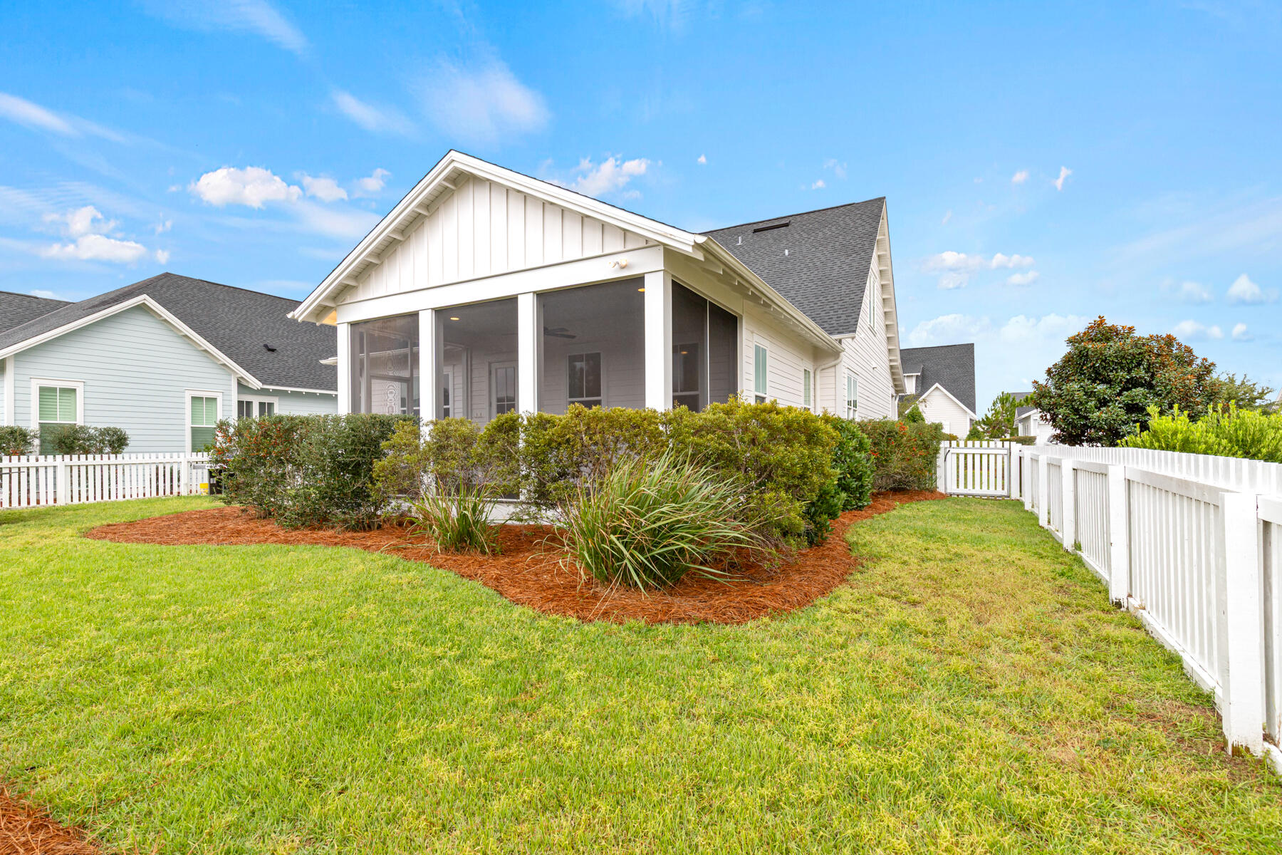 79 Basal St Inlet Beach Inlet Beach, FL 32461 - Photo 13 of 41 a view of a house with a yard and potted plants
