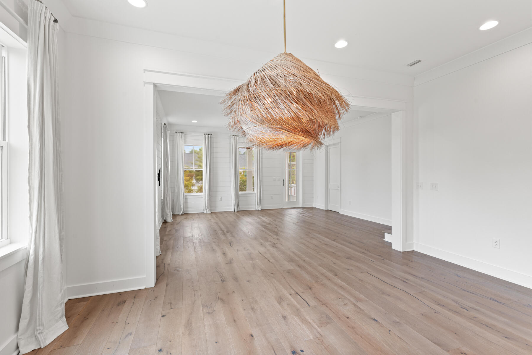 79 Basal St Inlet Beach Inlet Beach, FL 32461 - Photo 21 of 41 a view of a room with wooden floor and a large window
