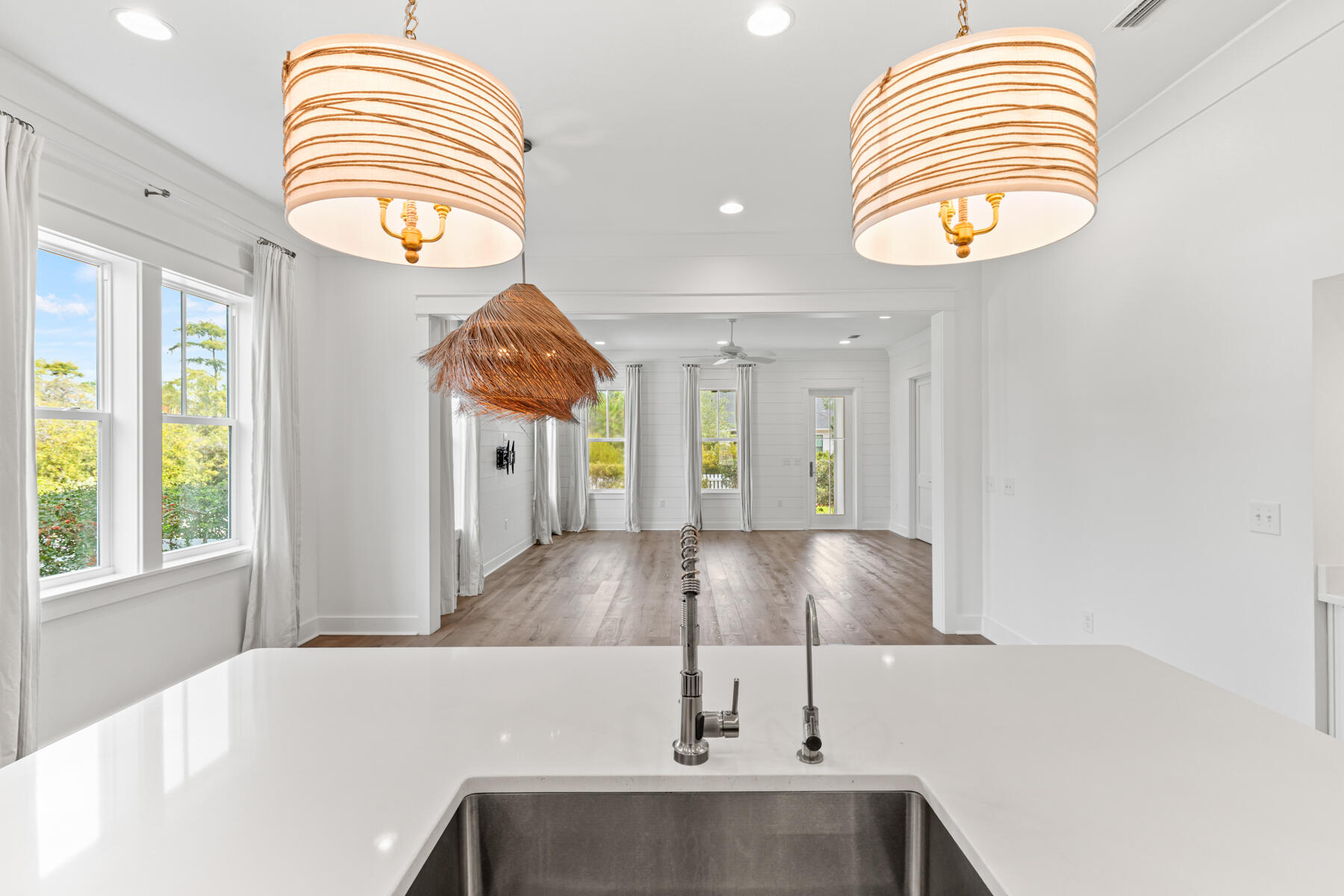 79 Basal St Inlet Beach Inlet Beach, FL 32461 - Photo 24 of 41 a view of a kitchen with a sink and a chandelier