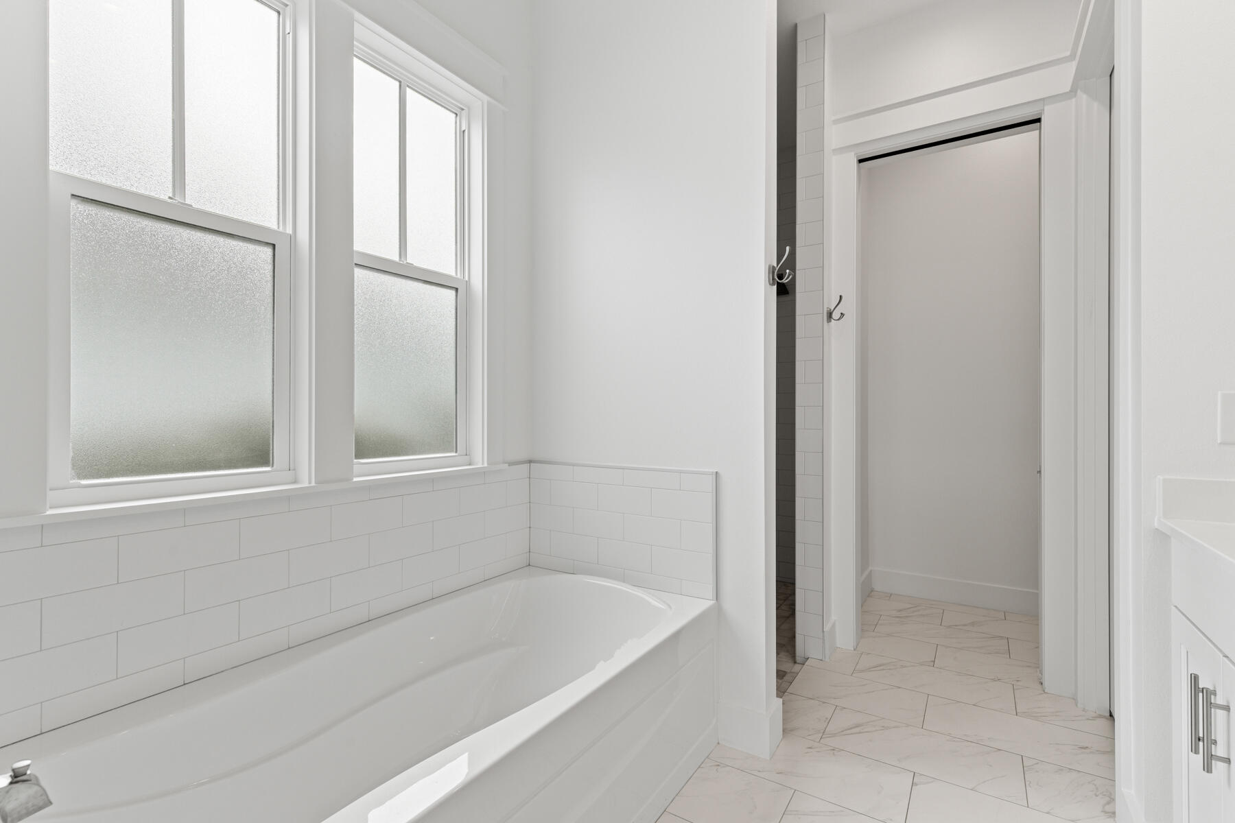 79 Basal St Inlet Beach Inlet Beach, FL 32461 - Photo 30 of 41 a bathroom with a bathtub and next to a window