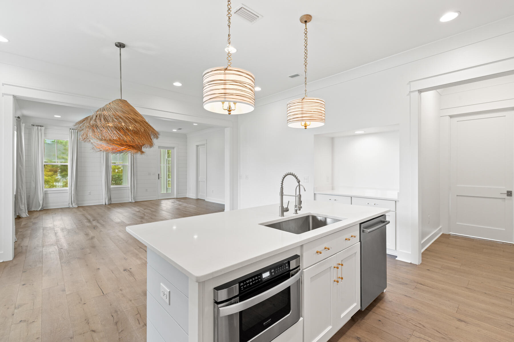 79 Basal St Inlet Beach Inlet Beach, FL 32461 - Photo 3 of 41 a kitchen that has a lot of cabinets and wooden floor