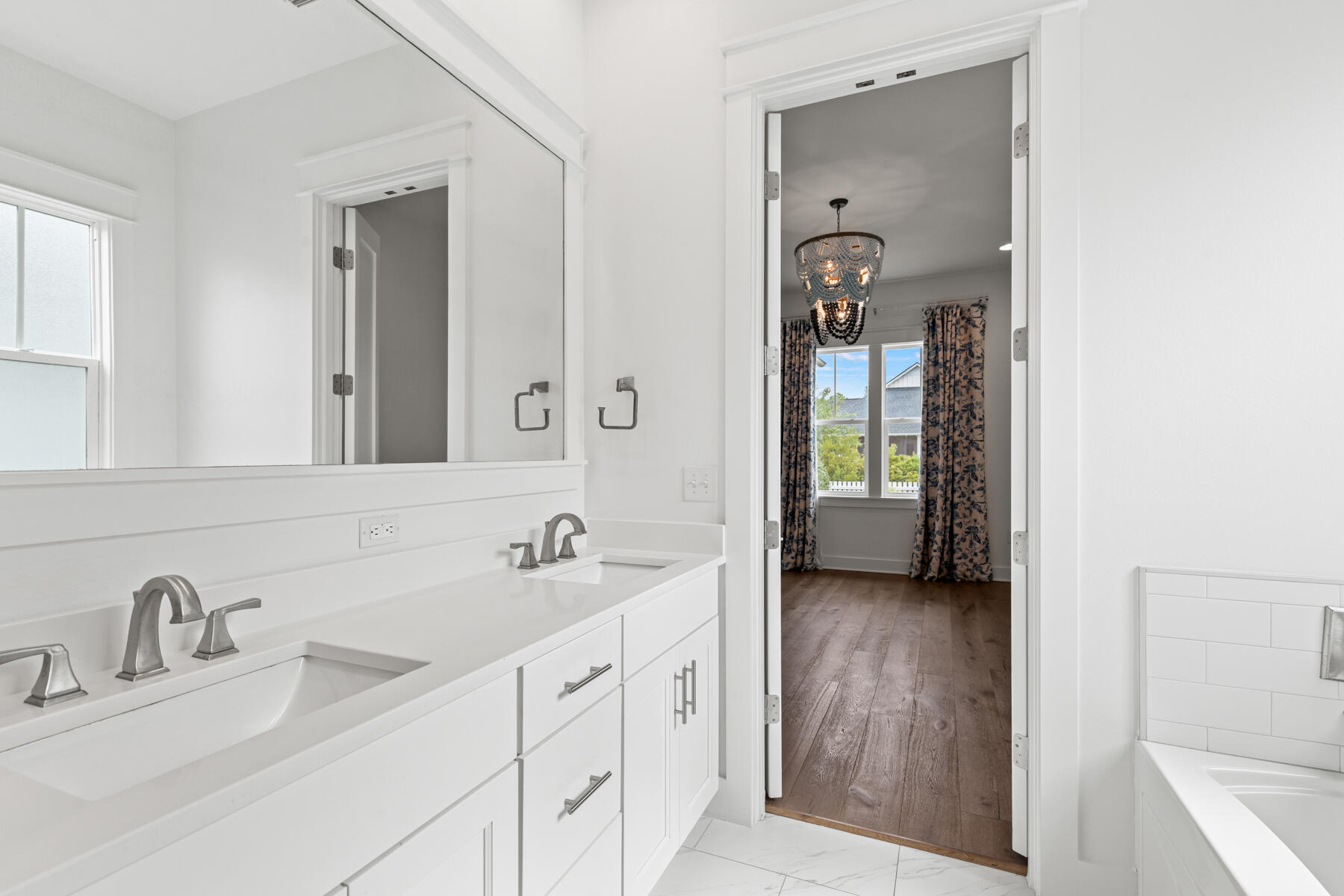 79 Basal St Inlet Beach Inlet Beach, FL 32461 - Photo 31 of 41 a en suite bathroom with 2 sink and a mirror