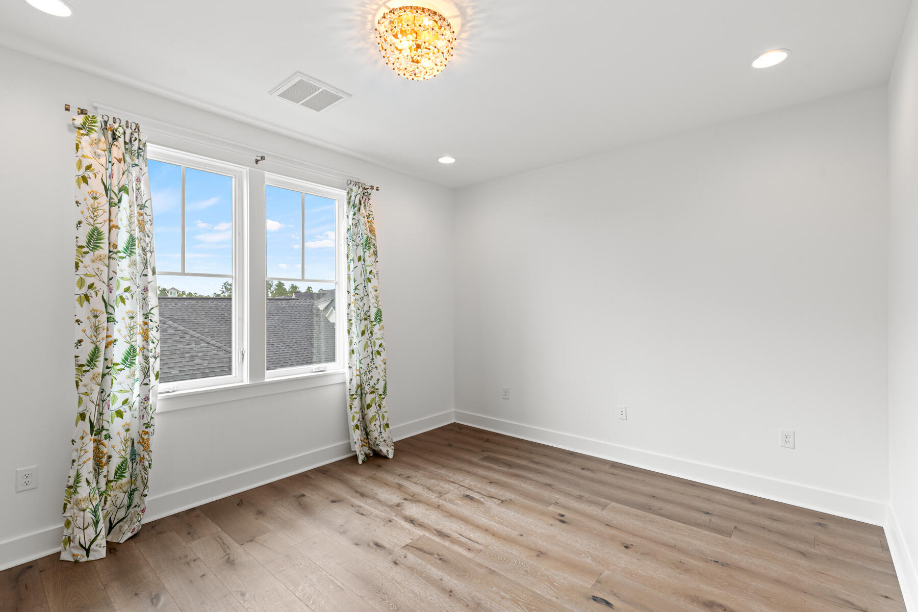 79 Basal St Inlet Beach Inlet Beach, FL 32461 - Photo 34 of 41 wooden floor in an empty room with a window