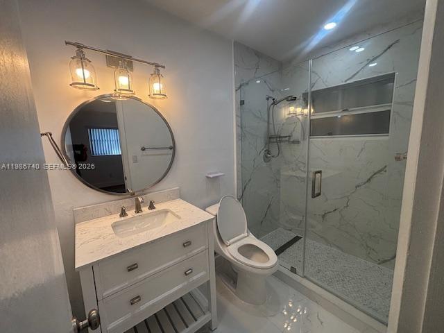 5215 Southwest 128th Avenue Miami, FL 33175 - Photo 11 of 20 a bathroom with a sink toilet and shower