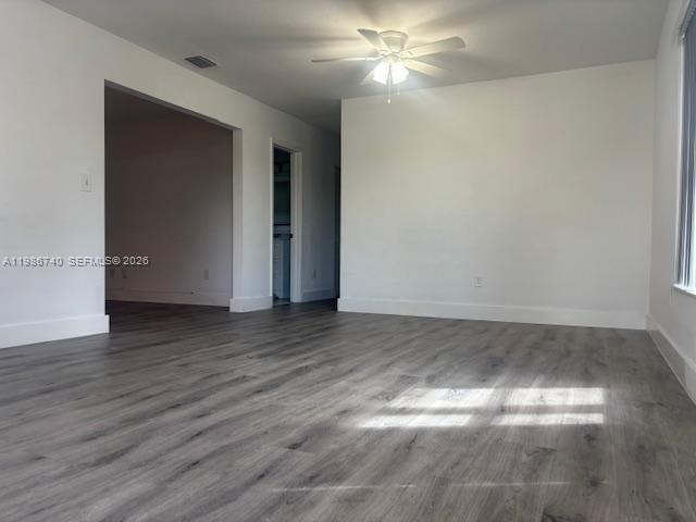 5215 Southwest 128th Avenue Miami, FL 33175 - Photo 15 of 20 a view of empty room with wooden floor