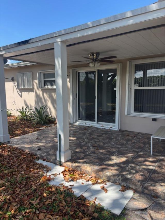 5215 Southwest 128th Avenue Miami, FL 33175 - Photo 19 of 20 a view of a house with a yard