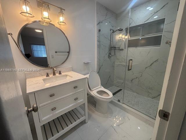 5215 Southwest 128th Avenue Miami, FL 33175 - Photo 10 of 20 a bathroom with a toilet sink and shower