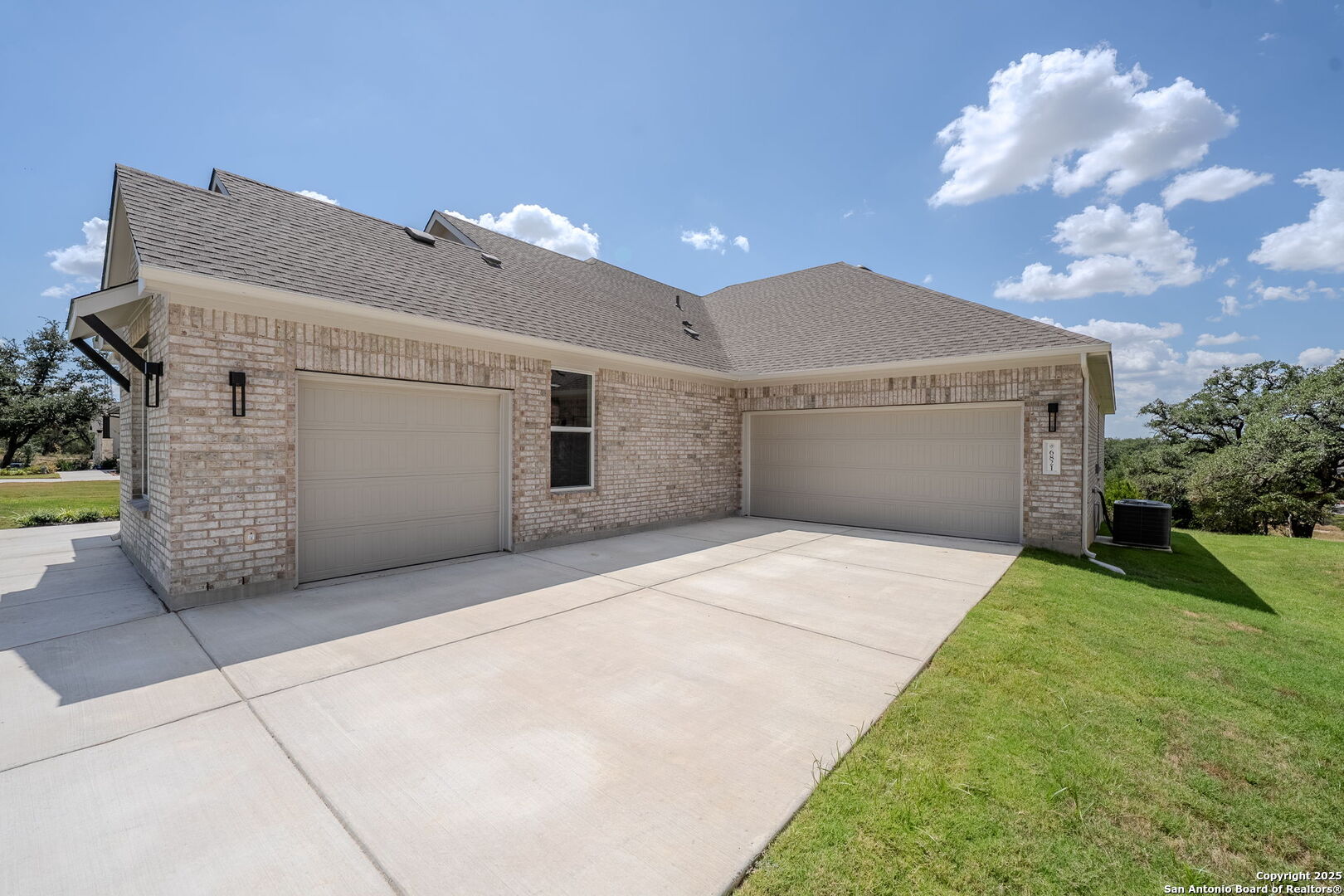 6821 Arbor Falls Fair Oaks Ranch, TX 78015 - Photo 3 of 50 a view of a house with a garage