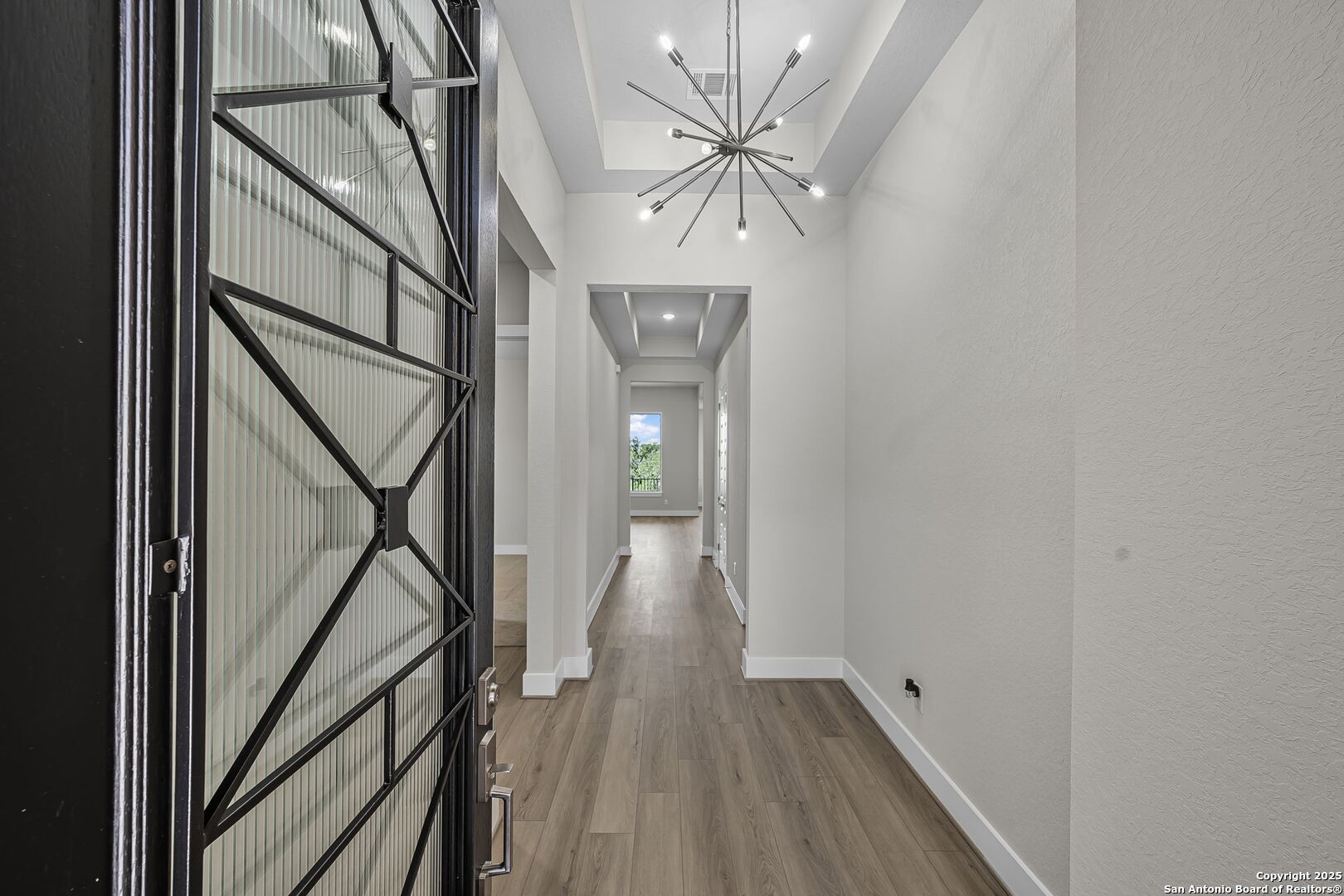 6821 Arbor Falls Fair Oaks Ranch, TX 78015 - Photo 5 of 50 a view of an entryway with wooden floor