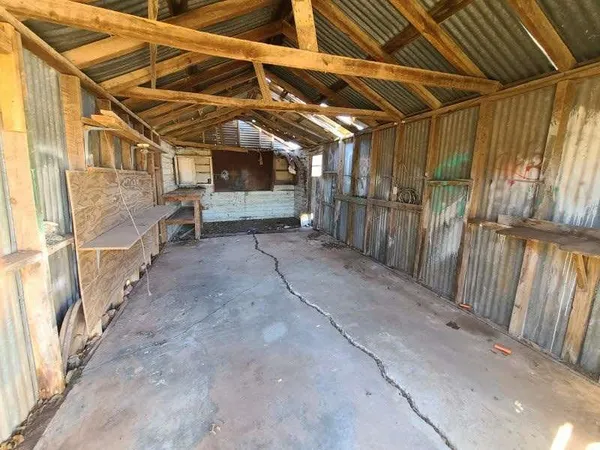 a view of under construction room and wooden roof