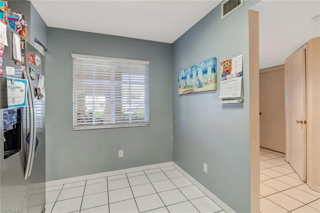 7750 Jewel Lane, Unit 101 Naples, FL 34109 - Photo 3 of 28 a view of an empty room