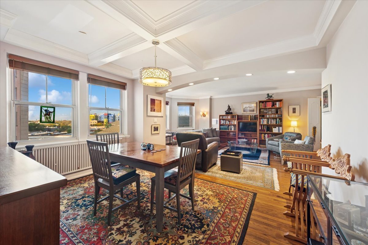 5555 North Sheridan Road, Unit 609 Chicago, IL 60640 - Photo 7 of 24 a view of a dining room with furniture