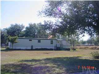 Mobile Home being sold "As Is" located on a bit less than half of the property and separately fenced.