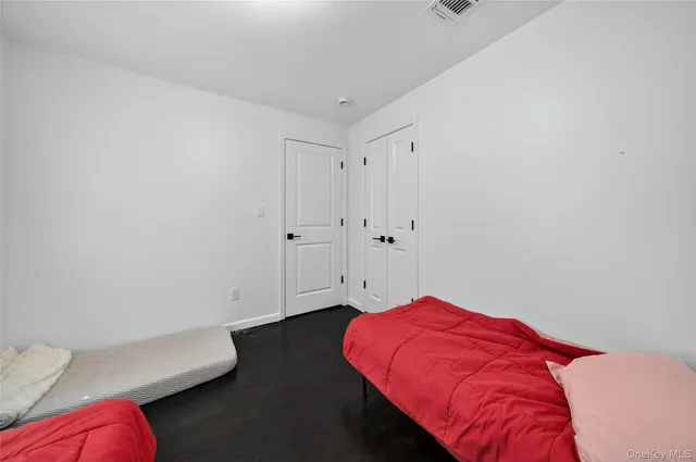 a balcony with wooden floor and furniture