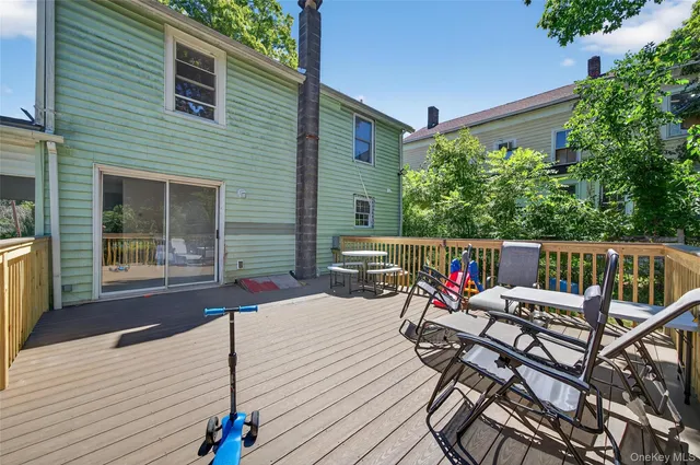 a view of a deck with furniture