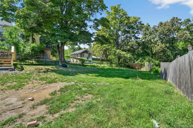 a view of backyard with green space