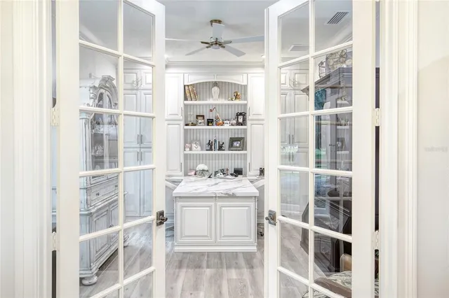 a view of a livingroom with furniture window and wooden floor
