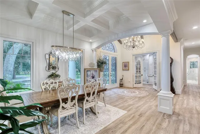 a living room with furniture a rug and a fireplace