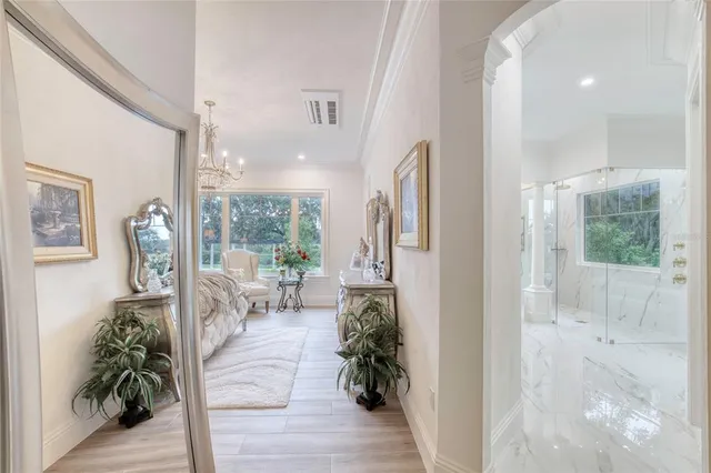 a view of a patio with a table and chairs