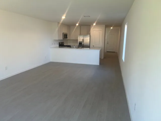 a view of a kitchen with a sink