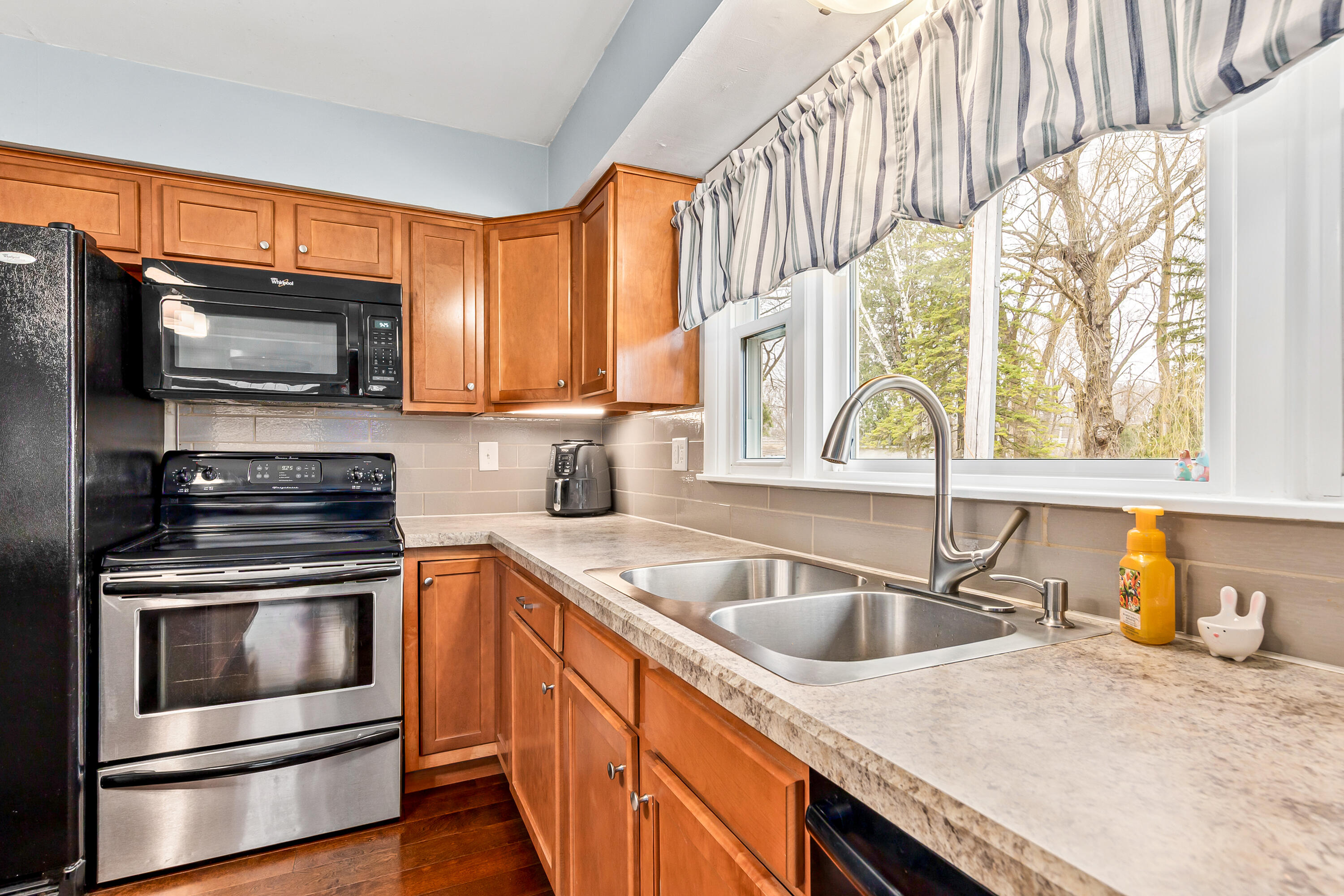 N20W28482 Oakton Road Pewaukee, WI 53072 - Photo 11 of 55 Spacious Kitchen workspace
