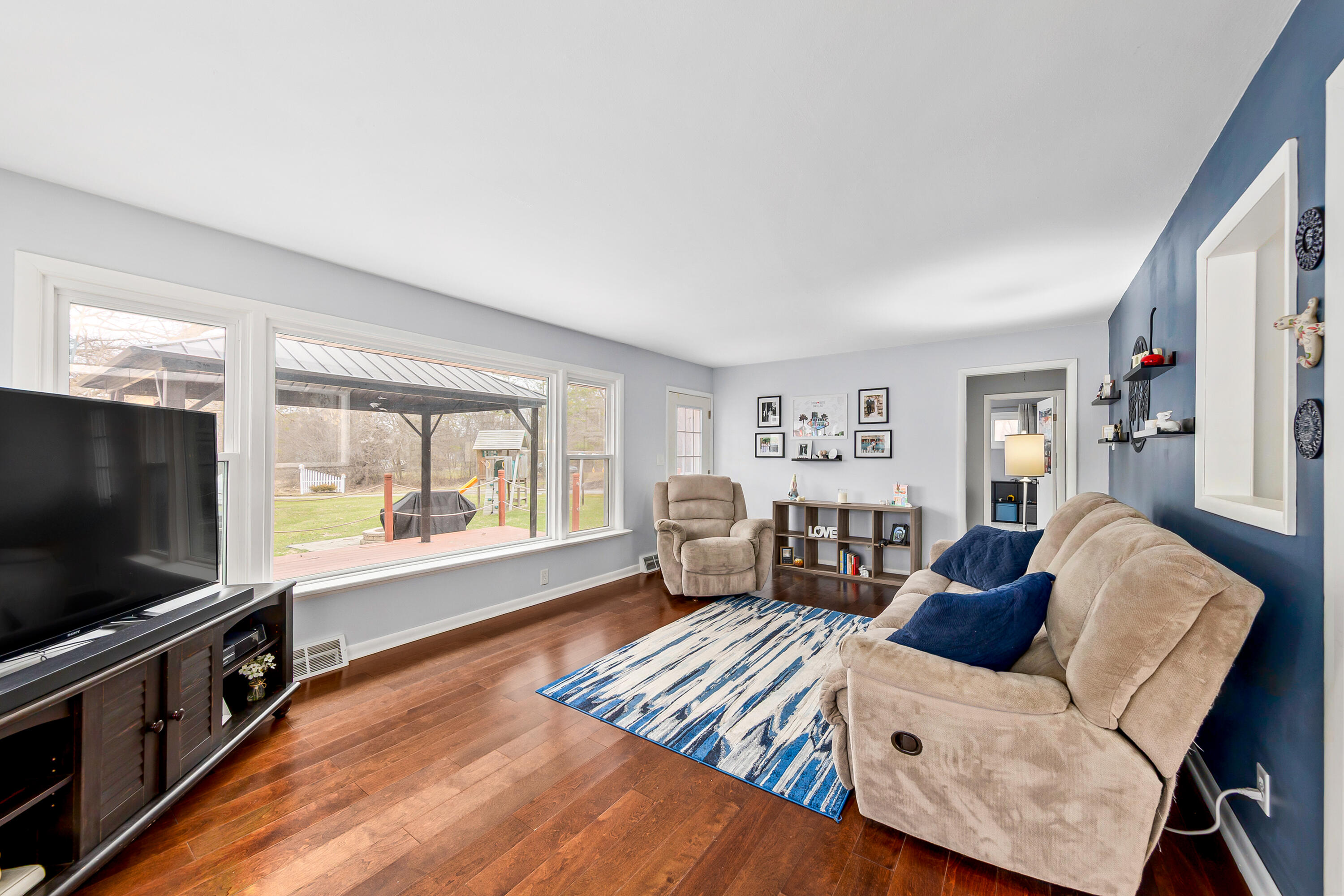 N20W28482 Oakton Road Pewaukee, WI 53072 - Photo 15 of 55 Open Family Room with sunlight
