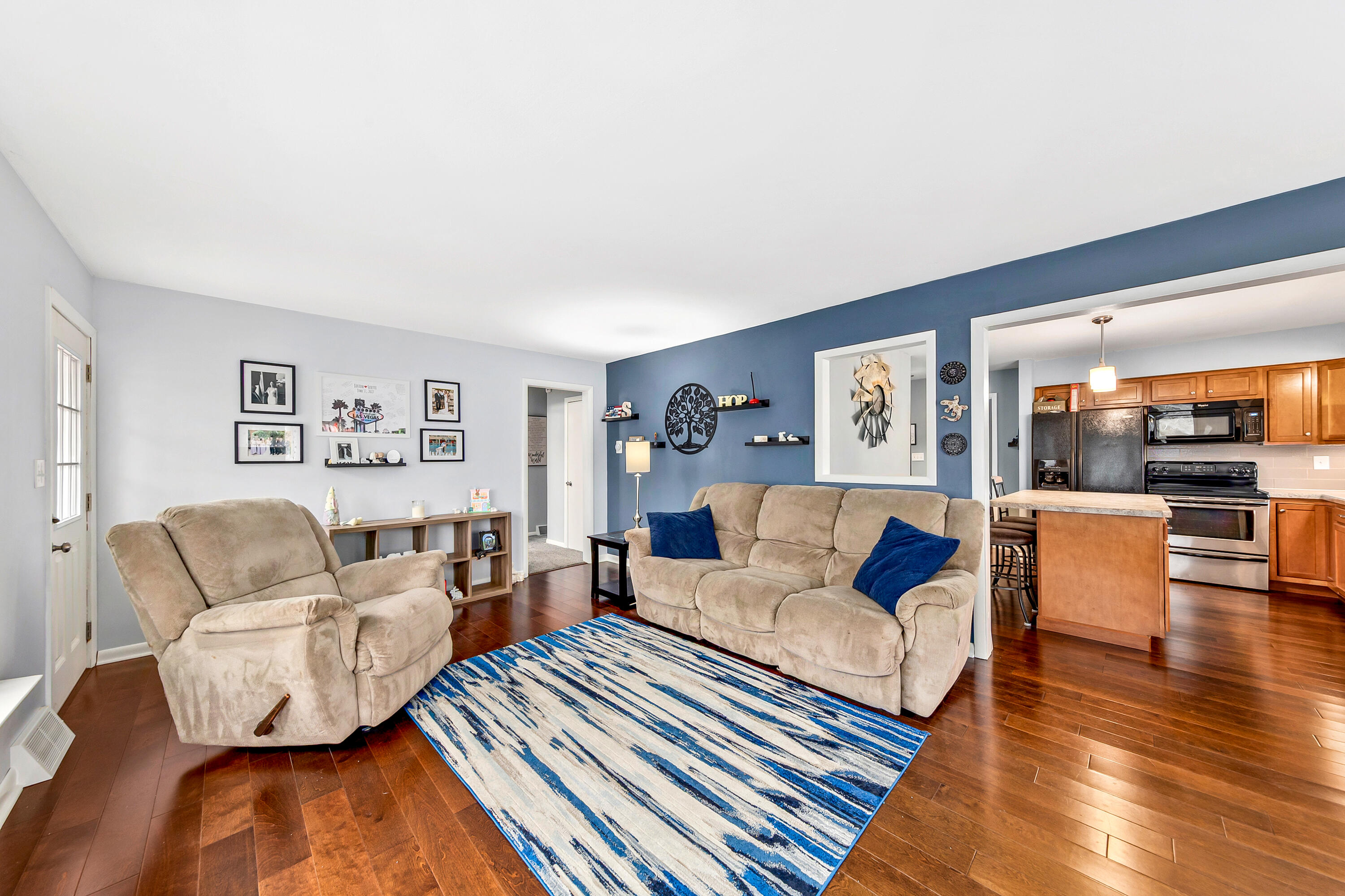 N20W28482 Oakton Road Pewaukee, WI 53072 - Photo 17 of 55 Flowing space to Kitchen