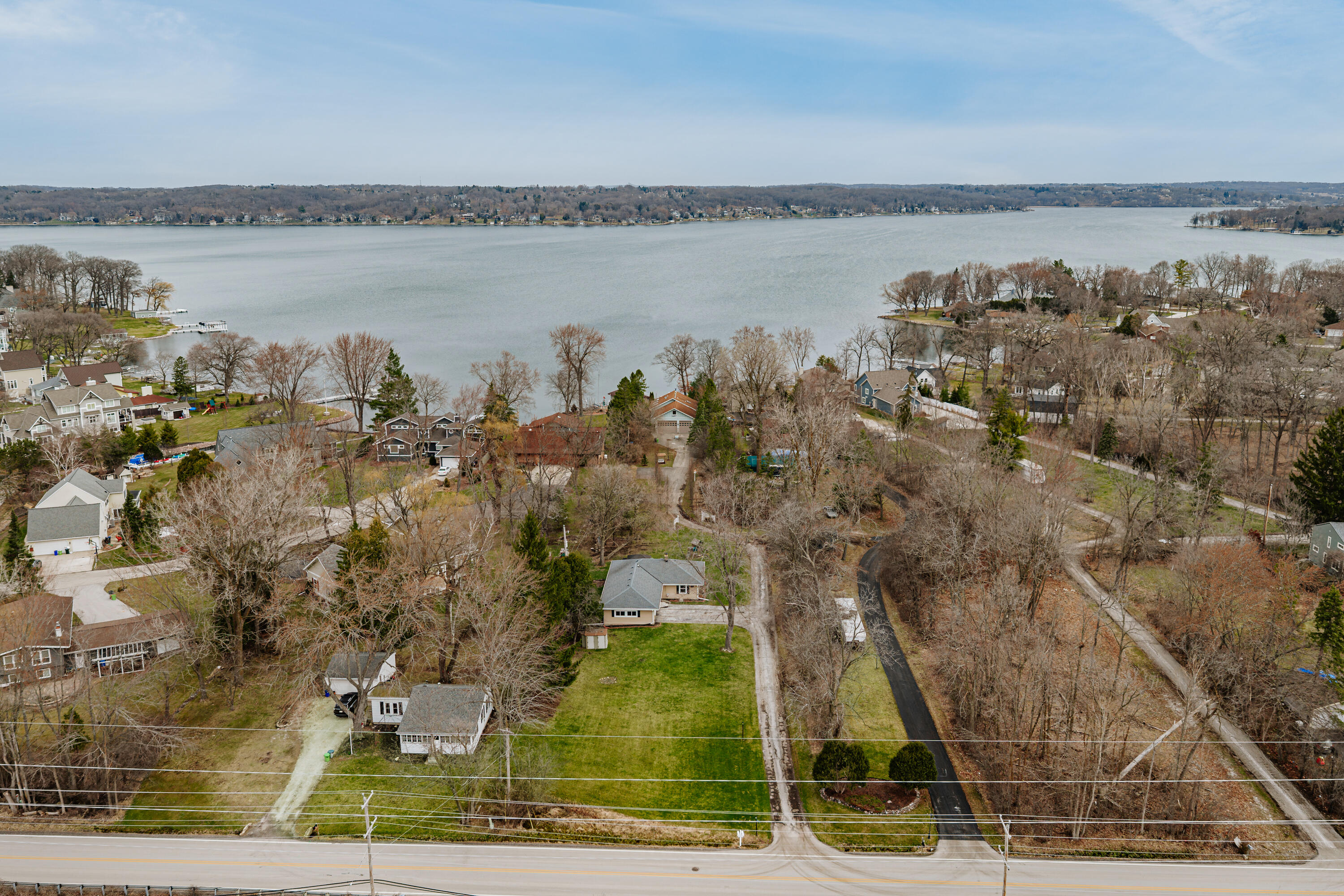 N20W28482 Oakton Road Pewaukee, WI 53072 - Photo 4 of 55 Drone view over home