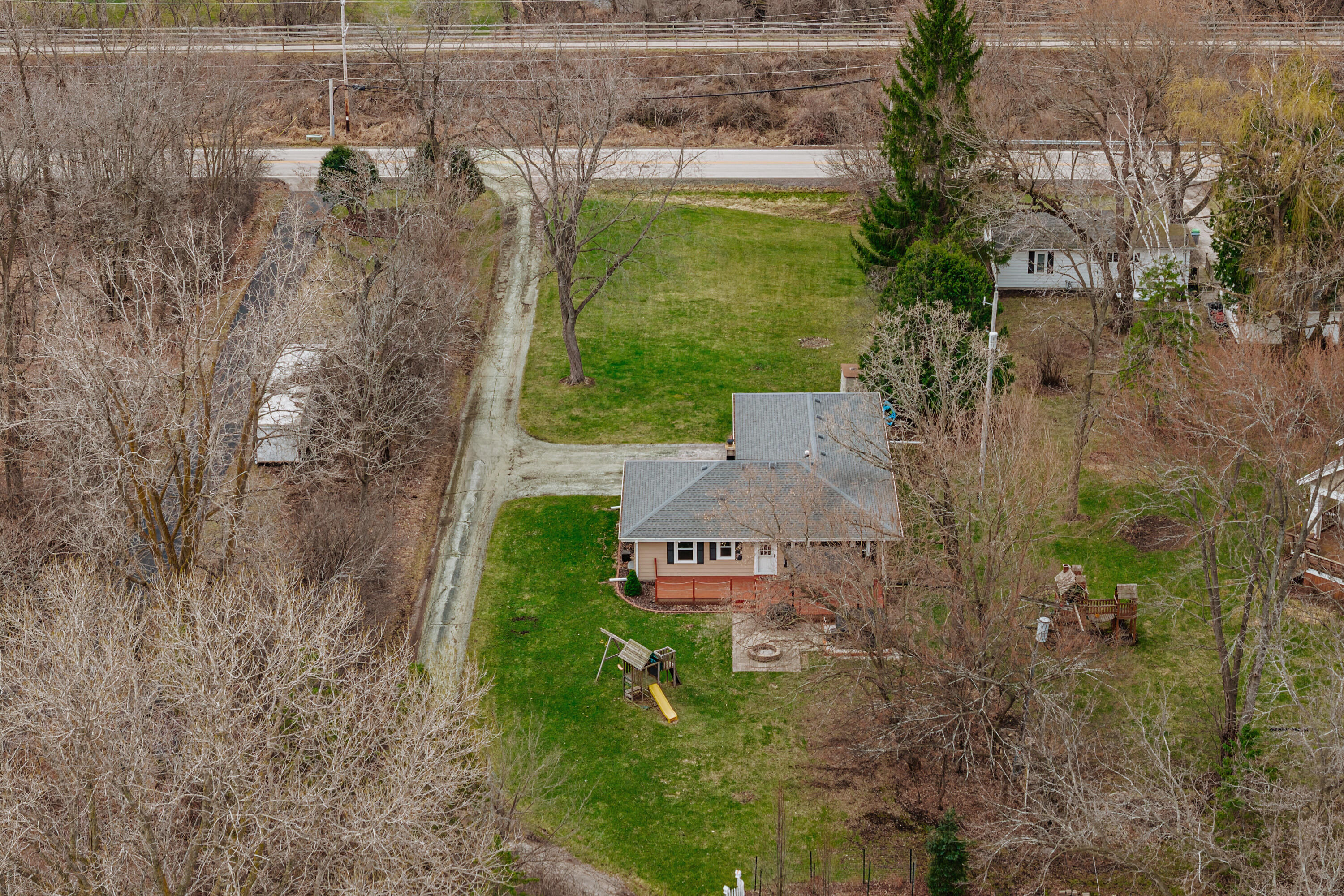 N20W28482 Oakton Road Pewaukee, WI 53072 - Photo 42 of 55 Home nestled in natural setting