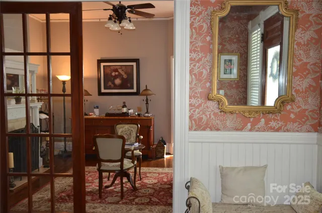 a view of a livingroom with furniture and window