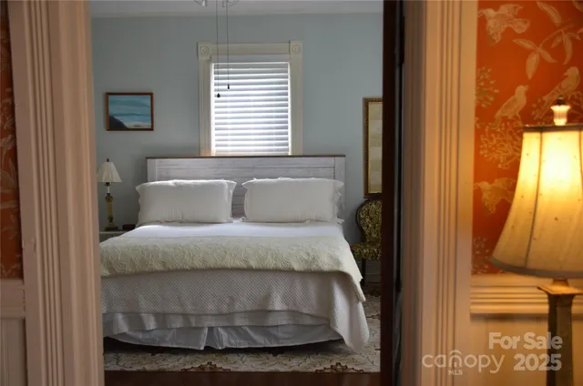 a view of a balcony with wooden floor and stairs