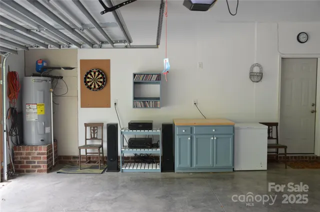 a view of kitchen with furniture and cabinets
