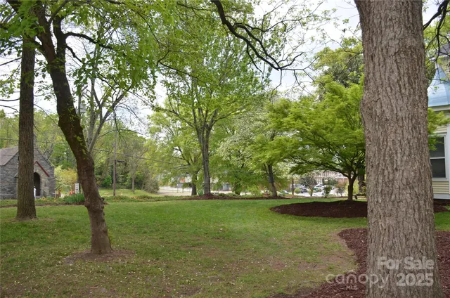 a view of outdoor space with deck and green space